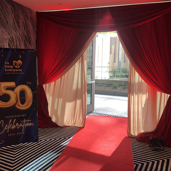 Draped Entrance with Red Carpet for 50 Year Anniversary Corporate Event in Los Angeles CA