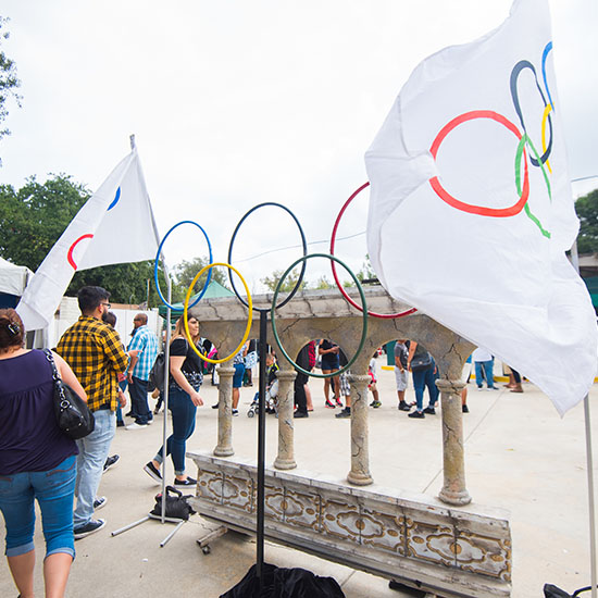 Olympic Rings and Flags Themed Picnic Decor at AltaMed's Olympic Picnic in Los Angeles