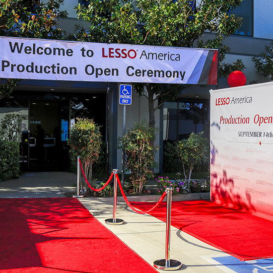 Red Carpet & Ribbon Event Design with Brande Signage at Lesso Grand Opening in Corona, California