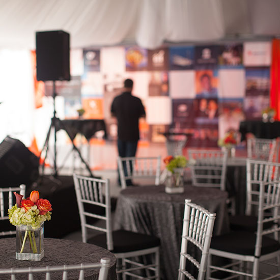 Tables with Floral Centerpieces & Branded Event Design at CSI 25th Anniversary Party in Los Angeles