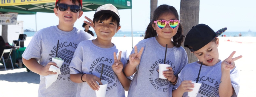 Kids with Branded T Shirts at Beach Picnic for Americas Tire