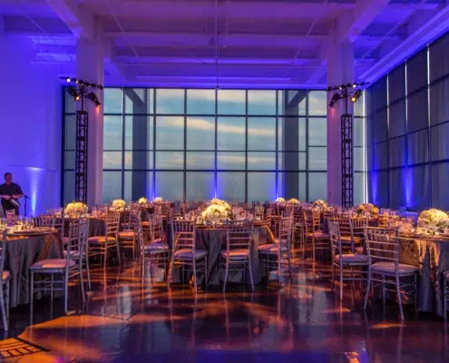 Catered Company Dinner Party with Lighting Tables and Centerpieces