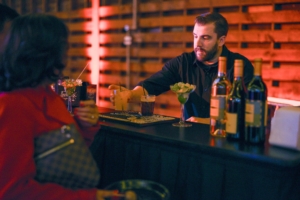 Bartender Serving Cocktails at Company Party Bartender Serving Cocktails at Company Party