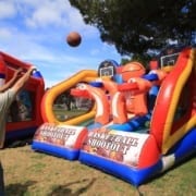 Employee Playing Hoop Shot at Company Picnic Employee Playing Hoop Shot at Company Picnic