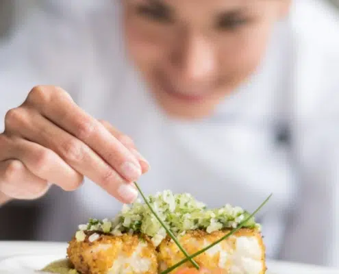 Catering Staff Plating a Dinner Plate