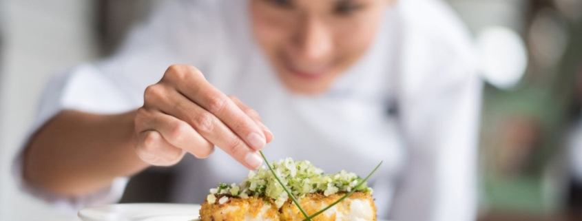 Catering Staff Plating a Dinner Plate Catering Staff Plating a Dinner Plate