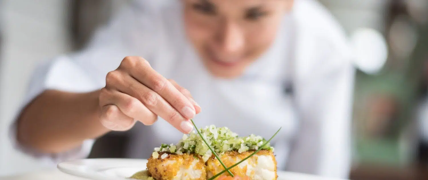 Catering Staff Plating a Dinner Plate