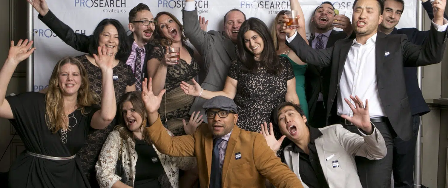 employees group photo at step n repeat