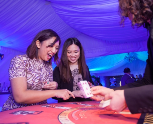 Guests Enjoying Casino Games Guests Enjoying Casino Games