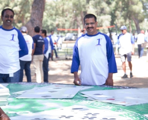 Casino Company Picnic Employees in Matching T Shirts Playing Giant Blackjack