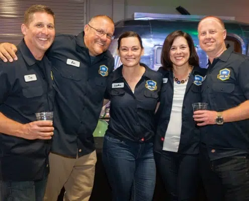 Happy Ari Employees at Garage Party