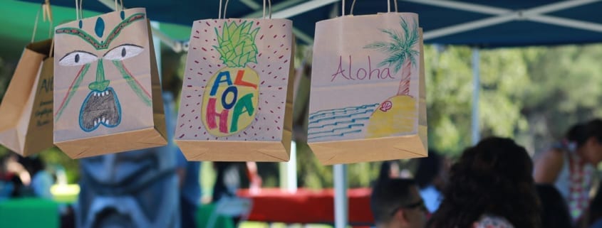 craft station at a luau themed company picnic