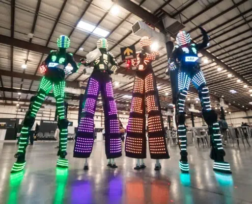 LED Stilt Walking Robots for Company Meeting Kick Off Party