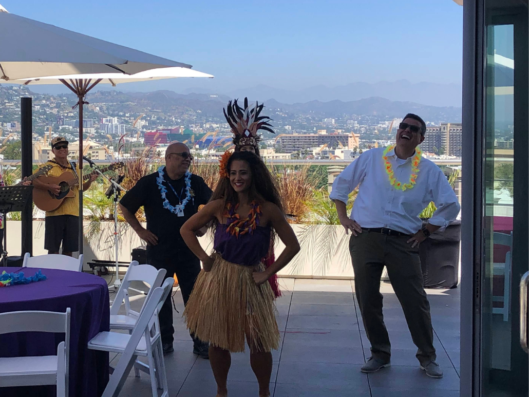 Beverly Hills Rooftop Tenant Apprecaition Event Showing Guests Interacting with Polynesian Dancers
