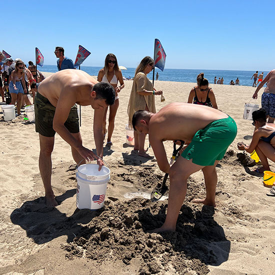 Teams Building Sand Castles as Beach Picnic Entertainment at Kern Pharma Seaside Picnic in Los Angeles