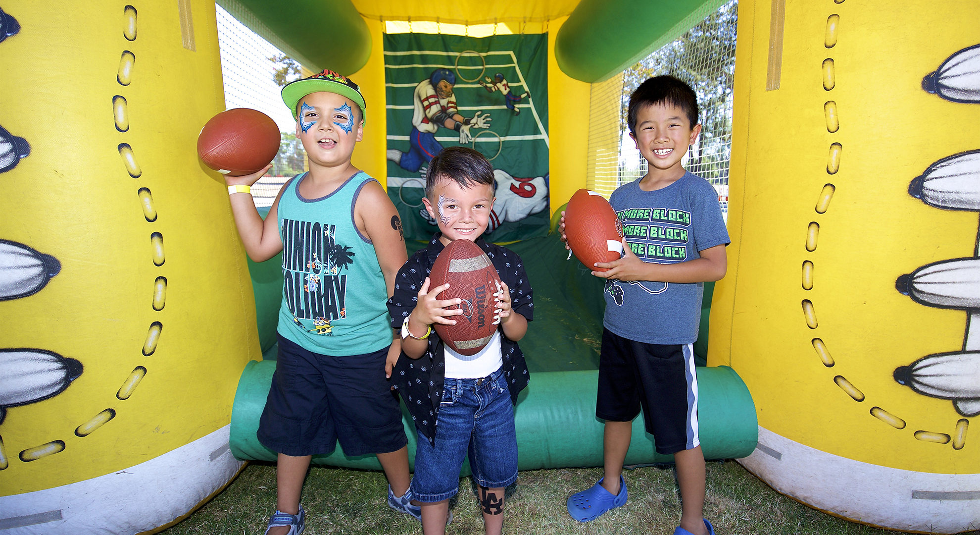 Kids Playing Football Picnic Inflatable Game at Classic OC Picnic in Orange County 16:9