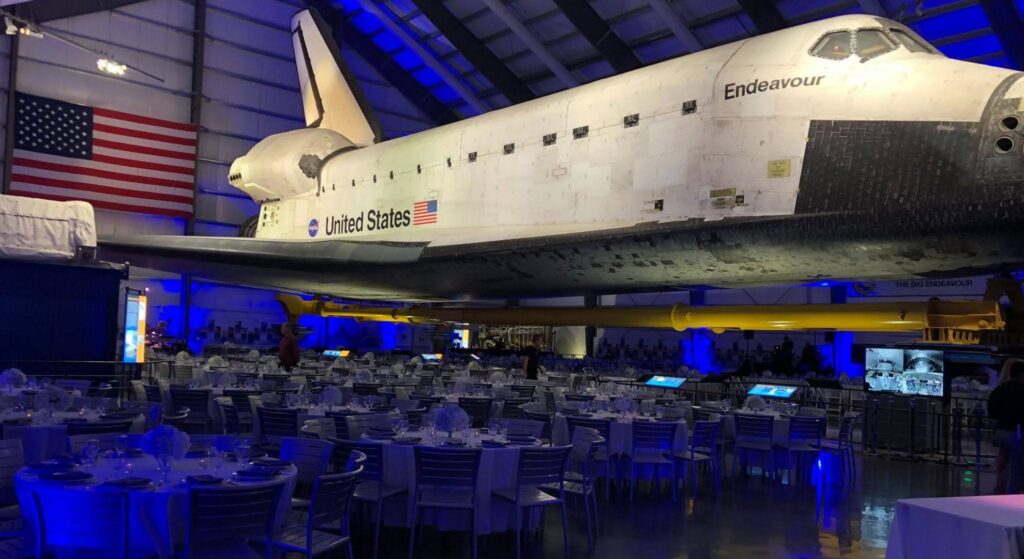 Endeavour Space Shuttle with Seating and Event Decor at LA Specialty Holiday Party in Los Angeles
